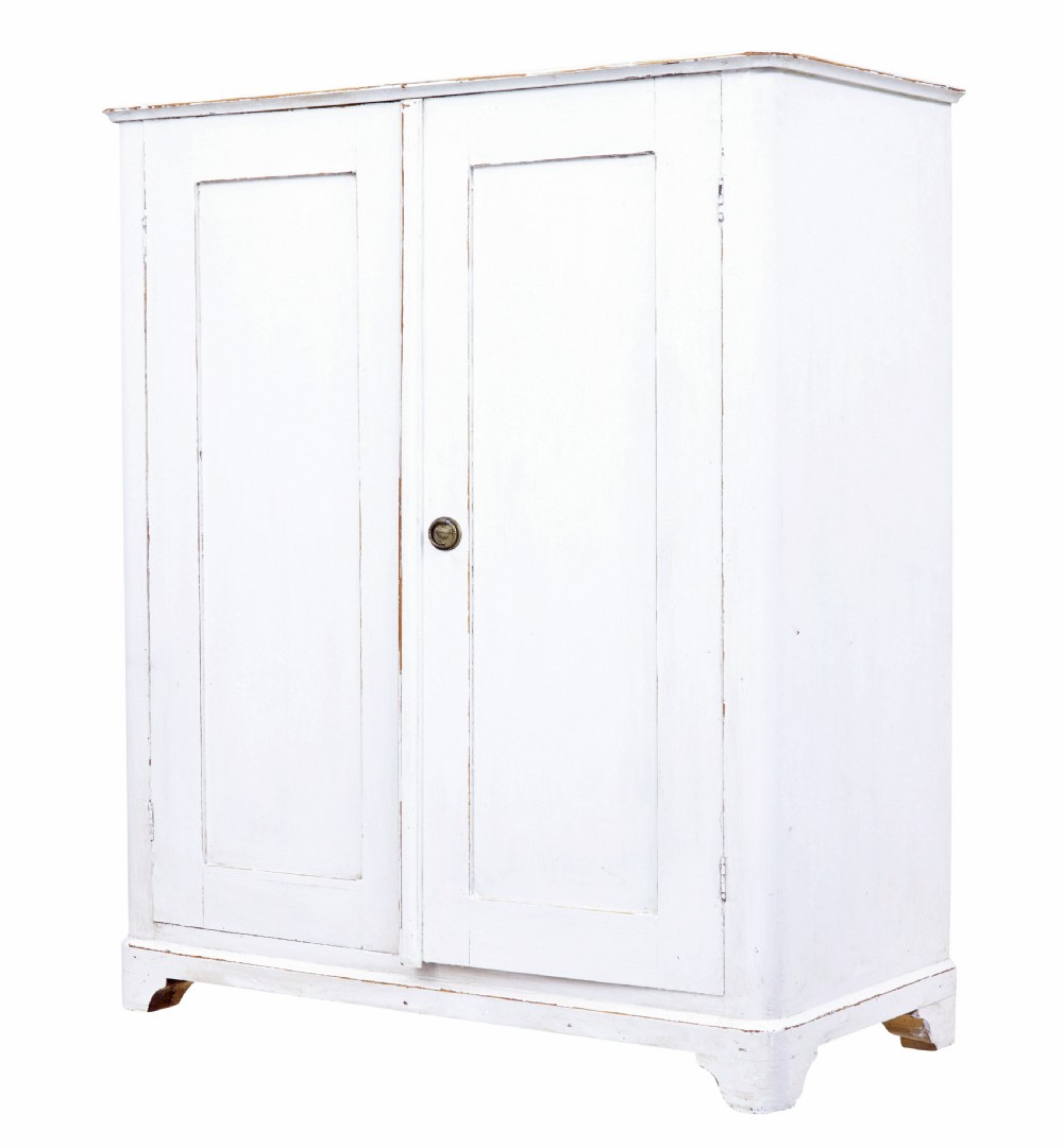 A 19th-century Swedish two-door pine cupboard finished in distressed off-white paint with a central brass knob.