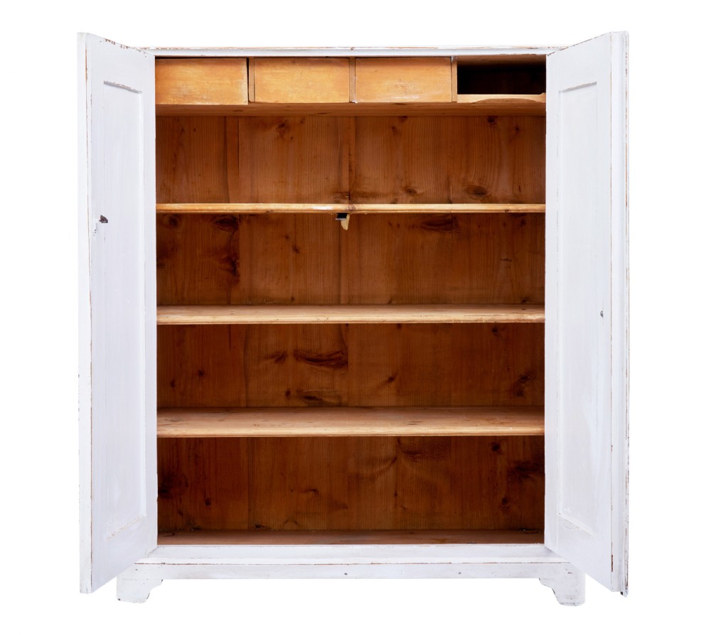 A 19th-century Swedish two-door pine cupboard finished in distressed off-white paint with a central brass knob. View III