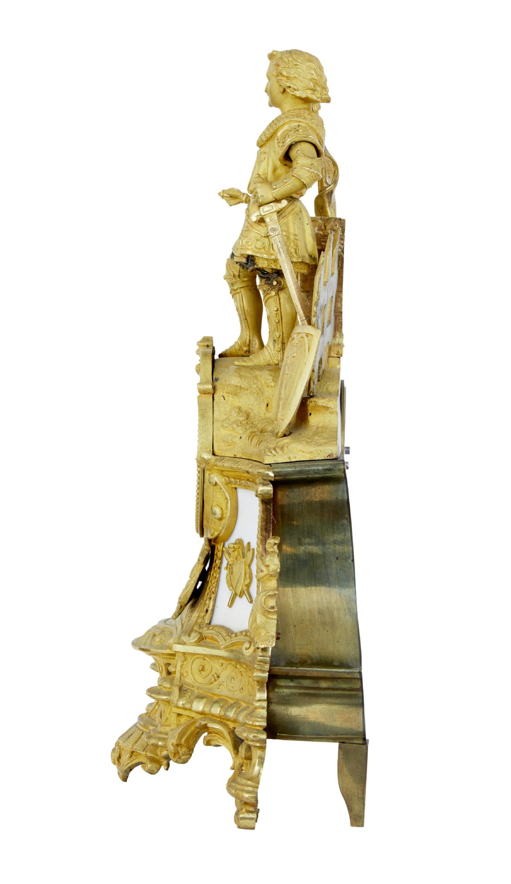A 19th-century French gilt bronze ormolu mantel clock featuring a knight figure holding a shield and flag above a white enamel Roman numeral dial set into a scrolled base. View V