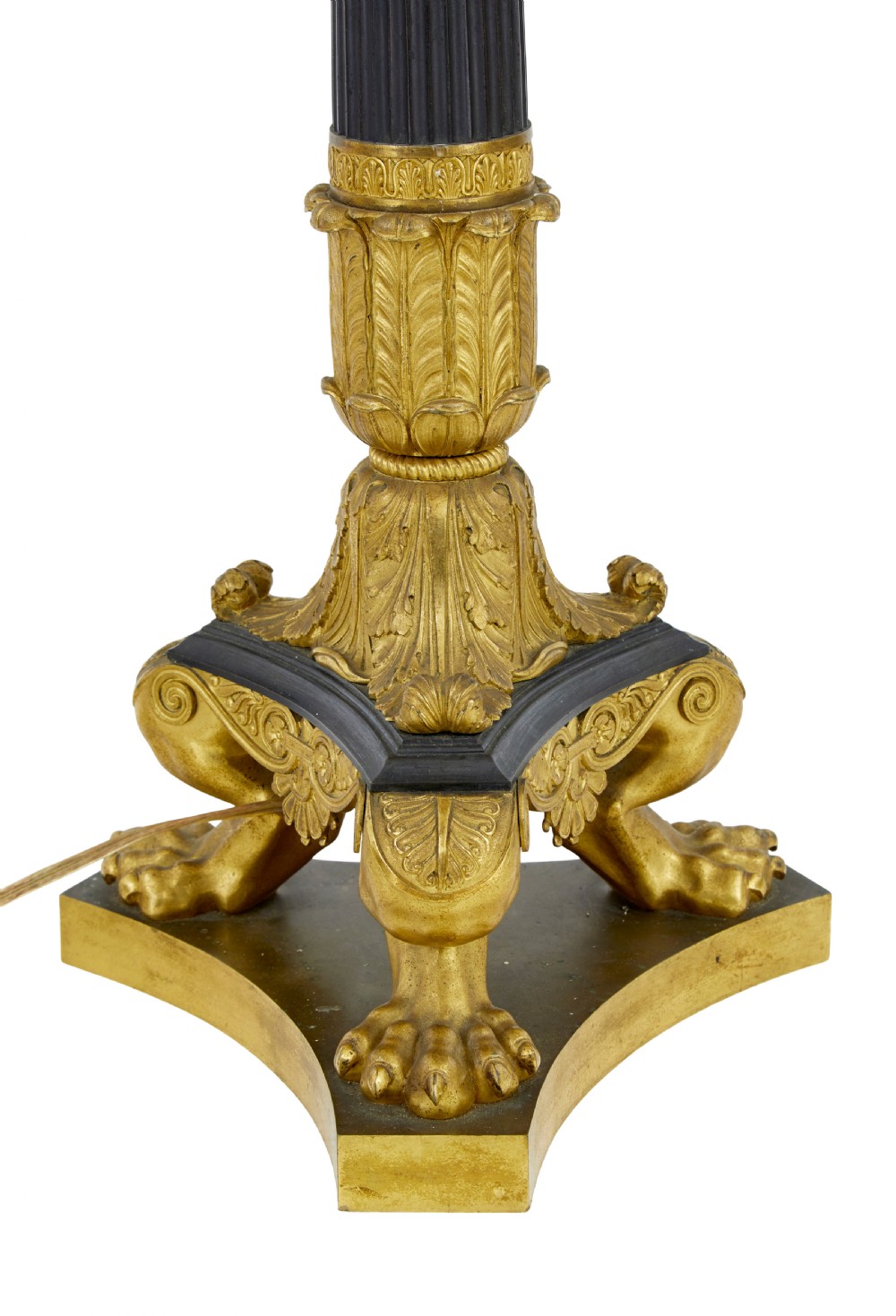 A 19th-century French Empire style table lamp featuring a fluted dark column, gilded leaf capital, tripod paw feet, and a triangular base. View IV
