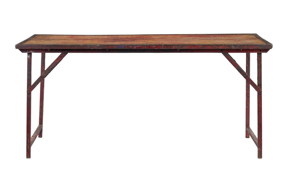 A rectangular folding table featuring a weathered wood top set within a distressed red-painted metal frame and leg structure. View II