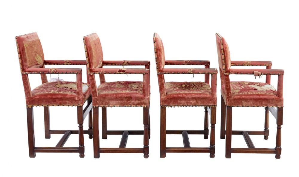 A set of 19th-century carved walnut armchairs with worn red velvet upholstery and embroidered decorative backrest panels. View III