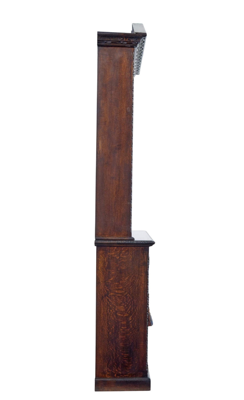 A 19th-century dark oak architectural cabinet featuring an open upper shelf section with a broken pediment crown and lower cupboard doors adorned with floral marquetry inlay. View VI