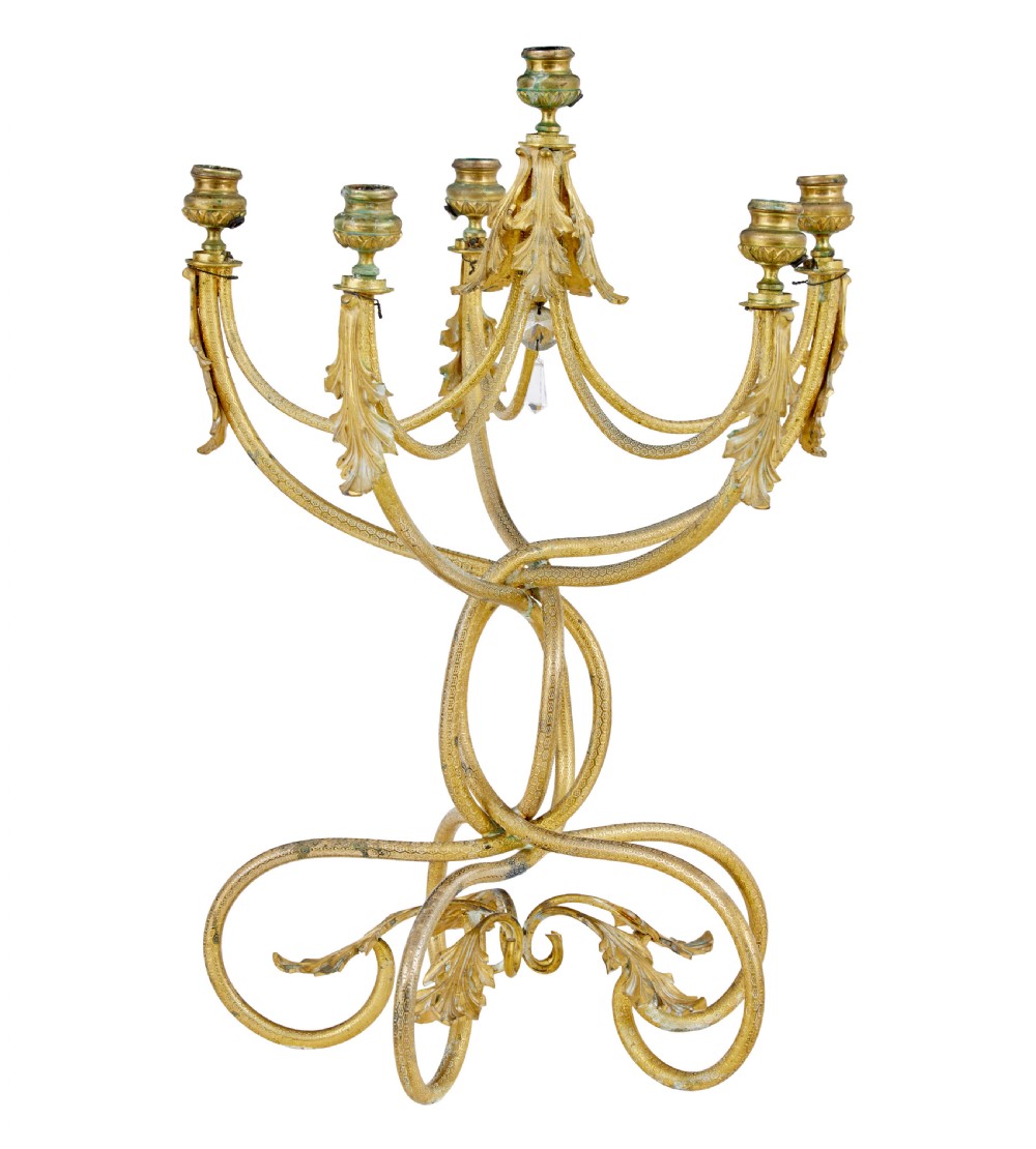 A 19th-century French gilded bronze six-light candelabra featuring curved scroll arms, acanthus leaf embellishments, and a central crystal pendant drop. View II