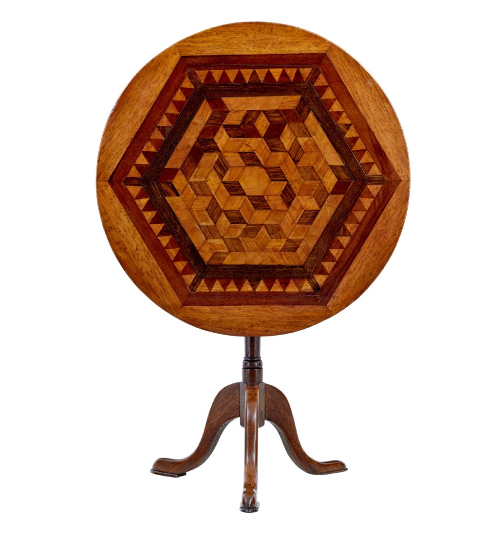 A 19th-century round oak occasional table featuring a geometric inlaid wood top, a turned central pedestal, and three splayed legs. View IV