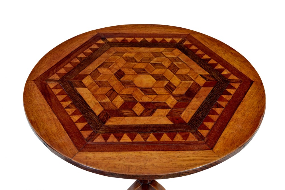 A 19th-century round oak occasional table featuring a geometric inlaid wood top, a turned central pedestal, and three splayed legs. View V