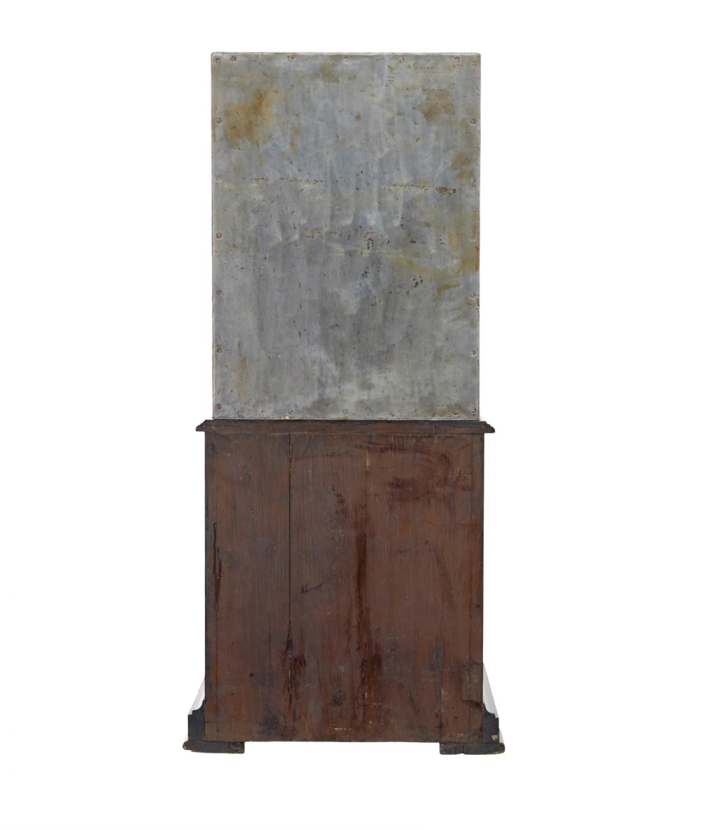 A 19th-century Danish polished steel safe with brass details mounted on a black painted wooden cabinet base. View VI