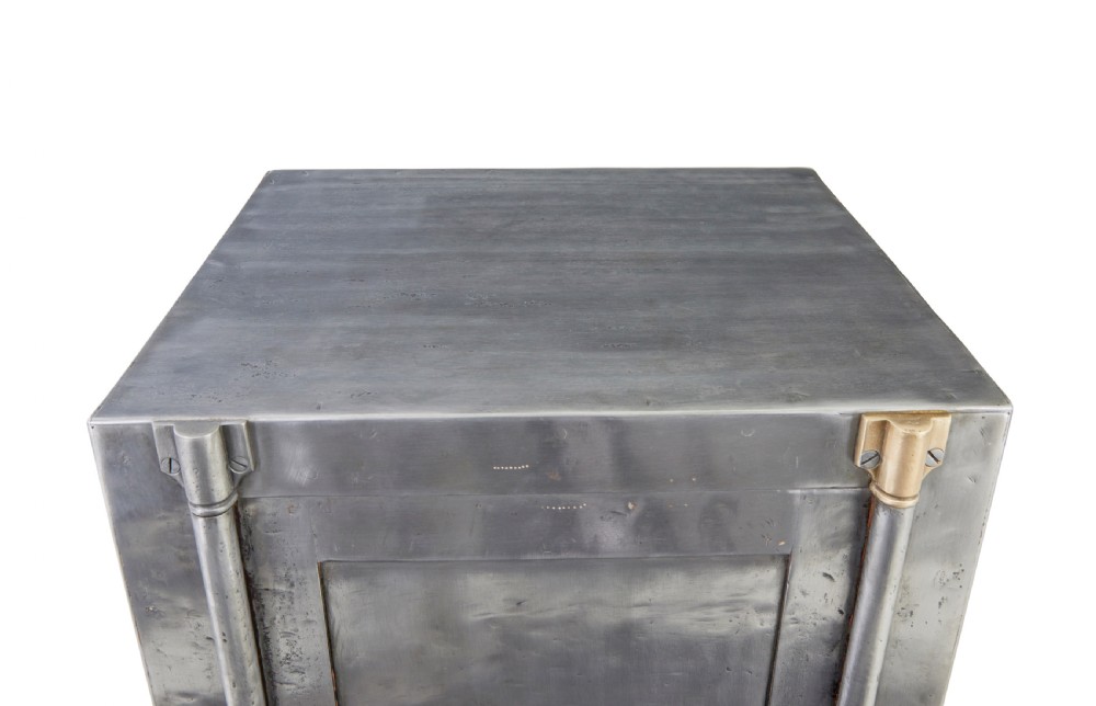 A 19th-century Danish polished steel safe with brass details mounted on a black painted wooden cabinet base. View IX