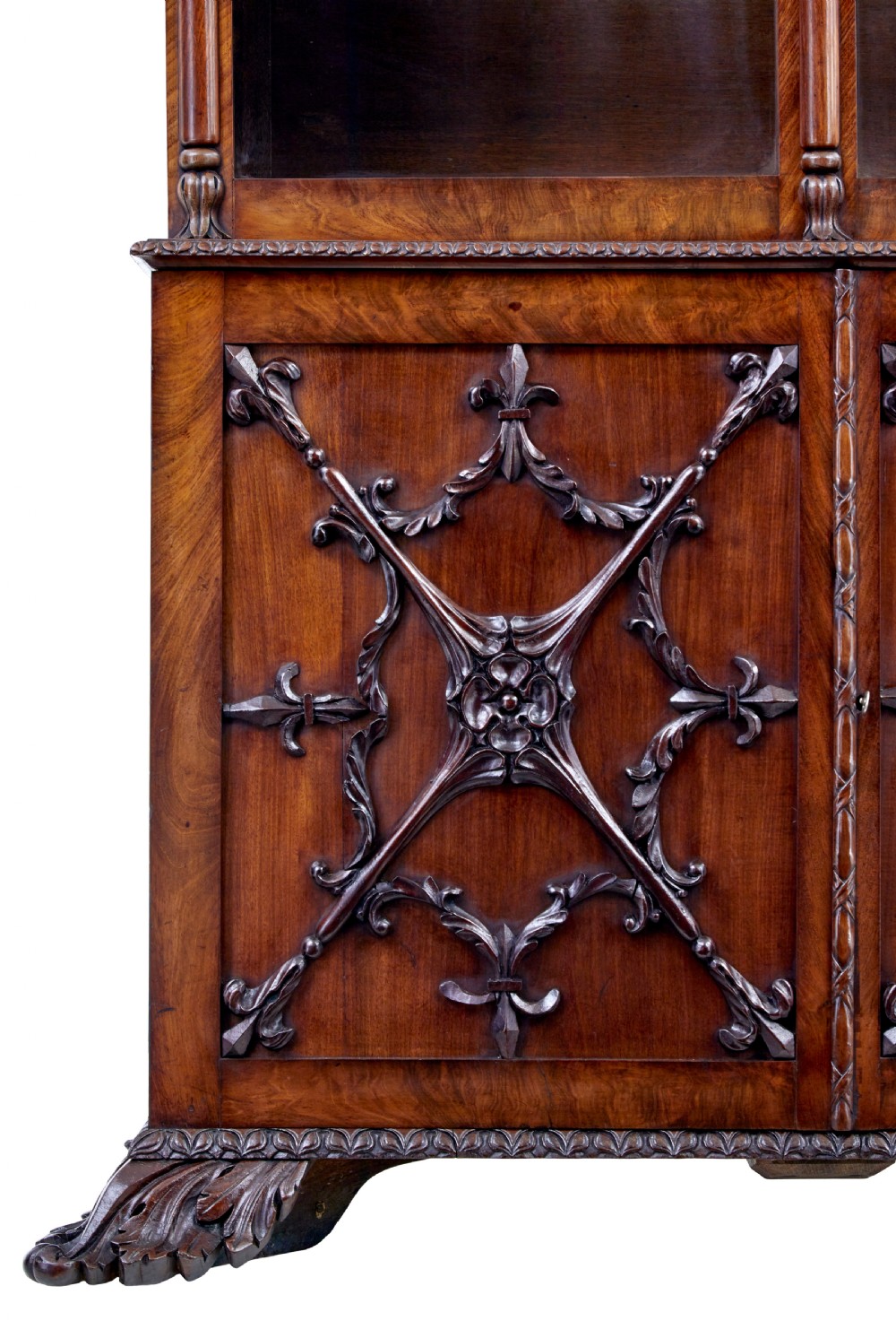 A mid-19th century Danish mahogany bookcase featuring a glazed upper display cabinet and lower doors with elaborate relief carvings. View X