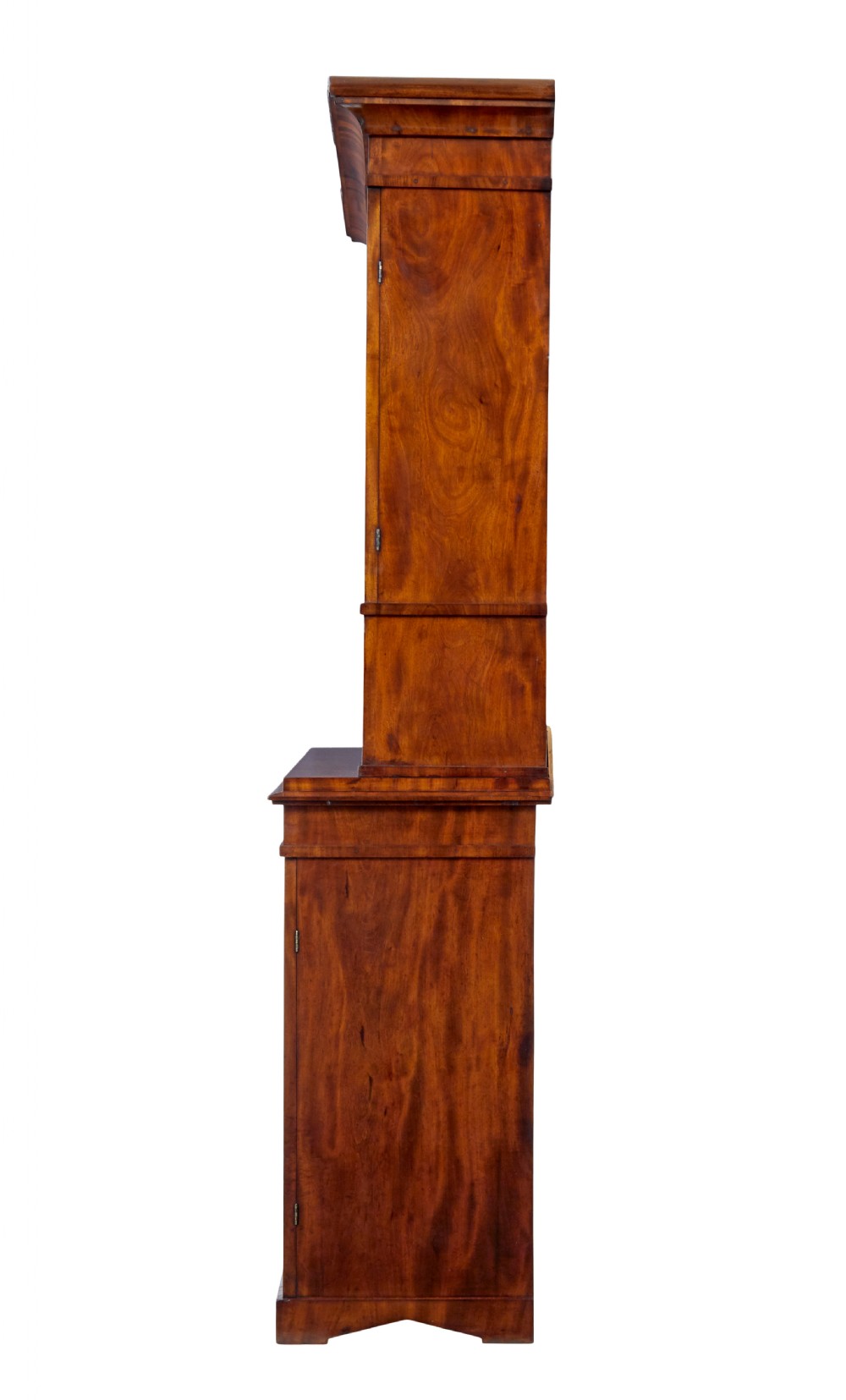A mid-19th-century Danish flame mahogany tall cabinet featuring a carved cresting pediment, open central niche, and double cupboard doors with moulded panels. View III