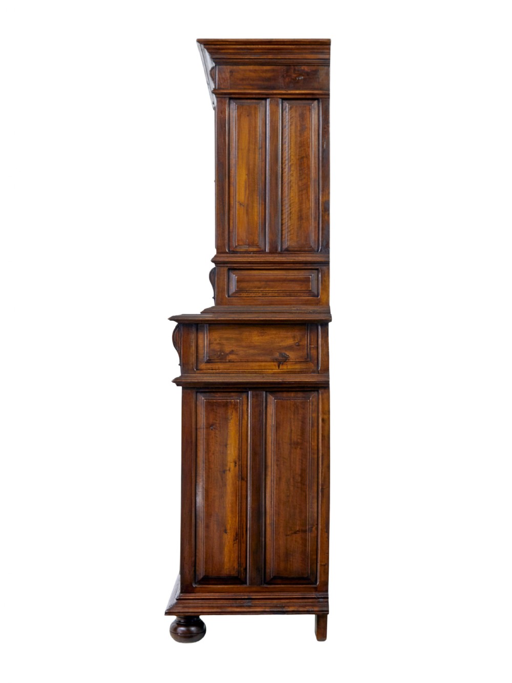 Mid 19th century dark walnut two-tiered Italian cabinet featuring intricately carved relief panels of figures, decorative drawers, and bun feet. View IV