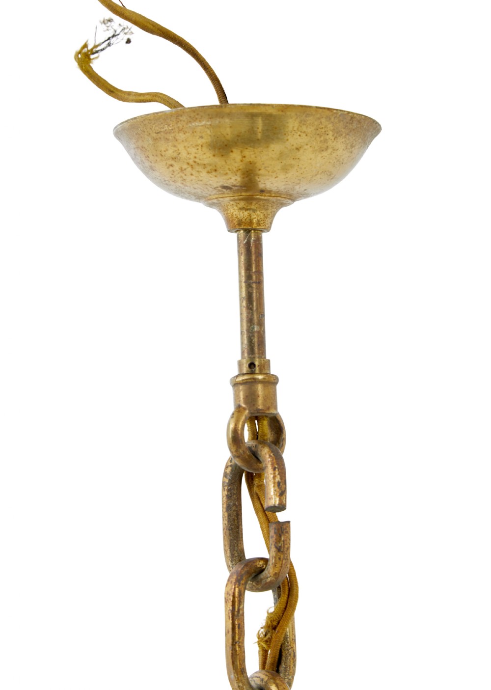 An early 20th century brass eight-arm chandelier featuring scrolling branches, circular drip pans, candle sleeves, a central baluster stem, and a suspension chain. View VII