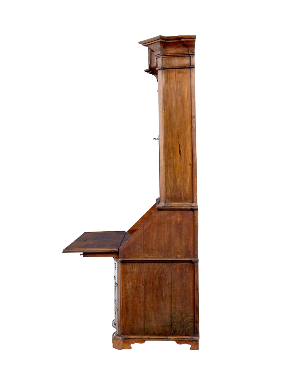 An 18th-century Norwegian carved oak bureau bookcase featuring an arched pediment, panelled upper doors, a slant-front writing slant, serpentine lower drawers, and brass escutcheons. View VII