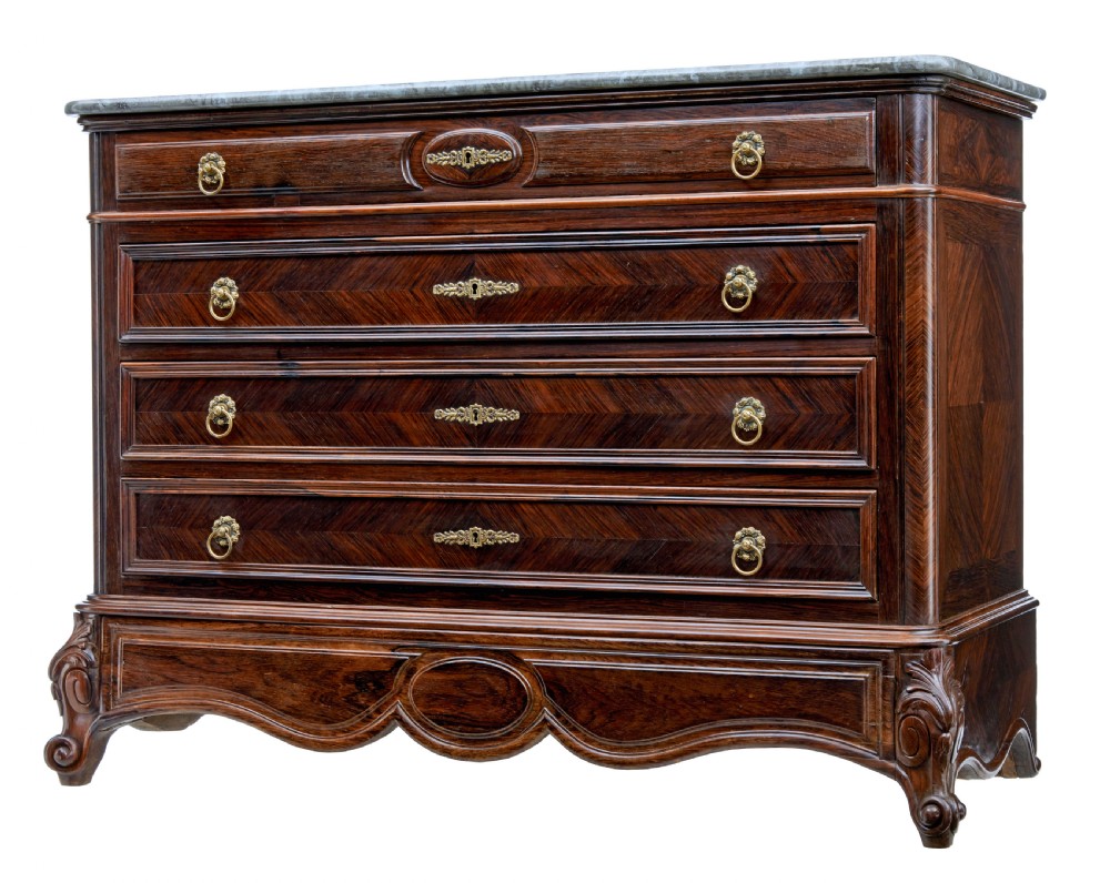 A nineteenth-century French palisander chest of drawers featuring chevron grain veneering, decorative brass drop handles, and a faux marble top. View II