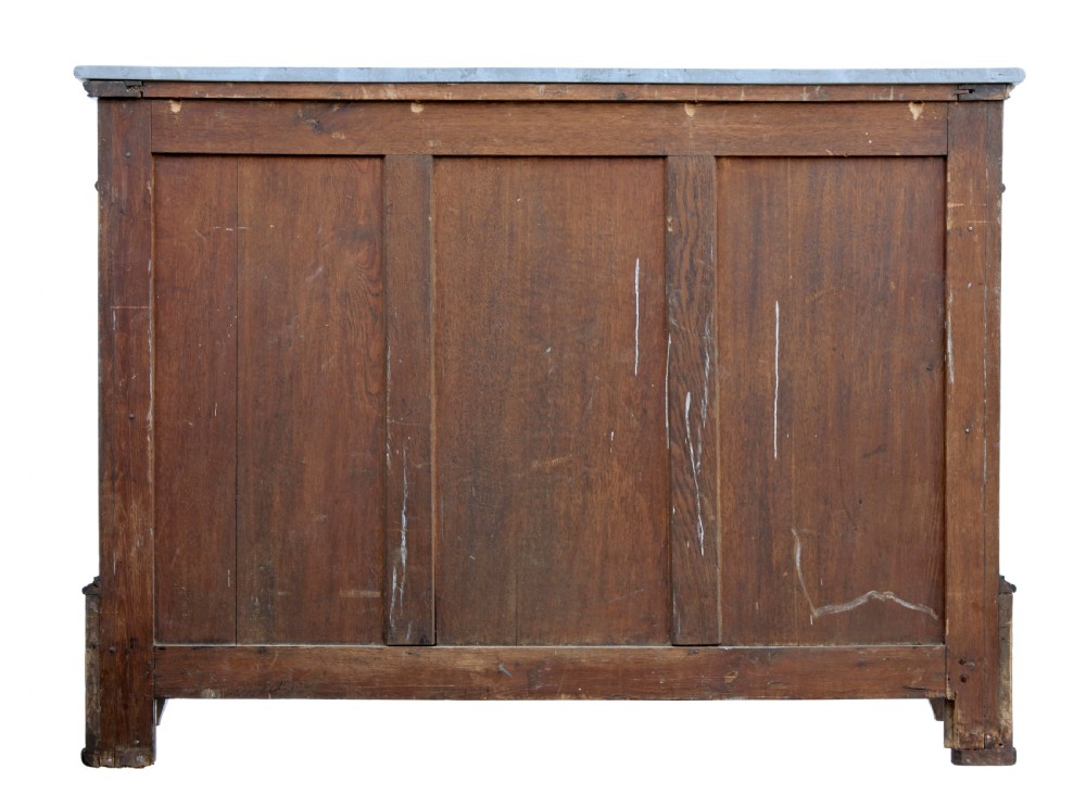A nineteenth-century French palisander chest of drawers featuring chevron grain veneering, decorative brass drop handles, and a faux marble top. View VI