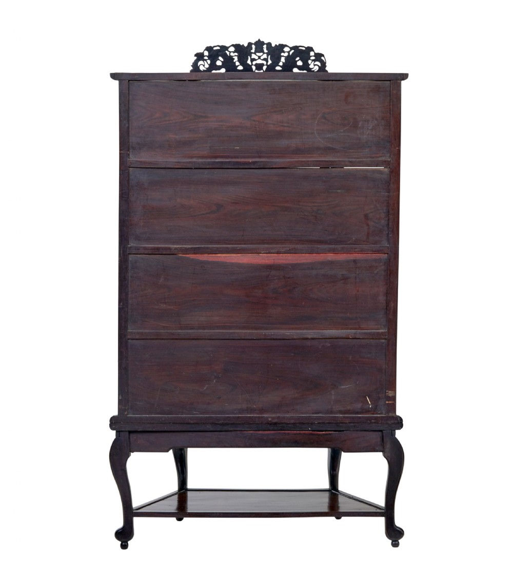 A 19th-century Chinese carved dark hardwood display cabinet featuring glazed doors, an intricate dragon cresting rail, and cabriole legs with a lower undertier. View IV