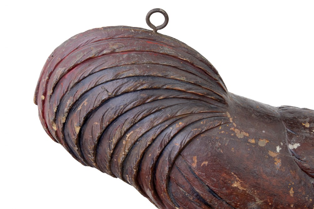 A 19th-century French carved solid wood rooster shop display with distressed painted surface layers and top iron hanging loops. View V