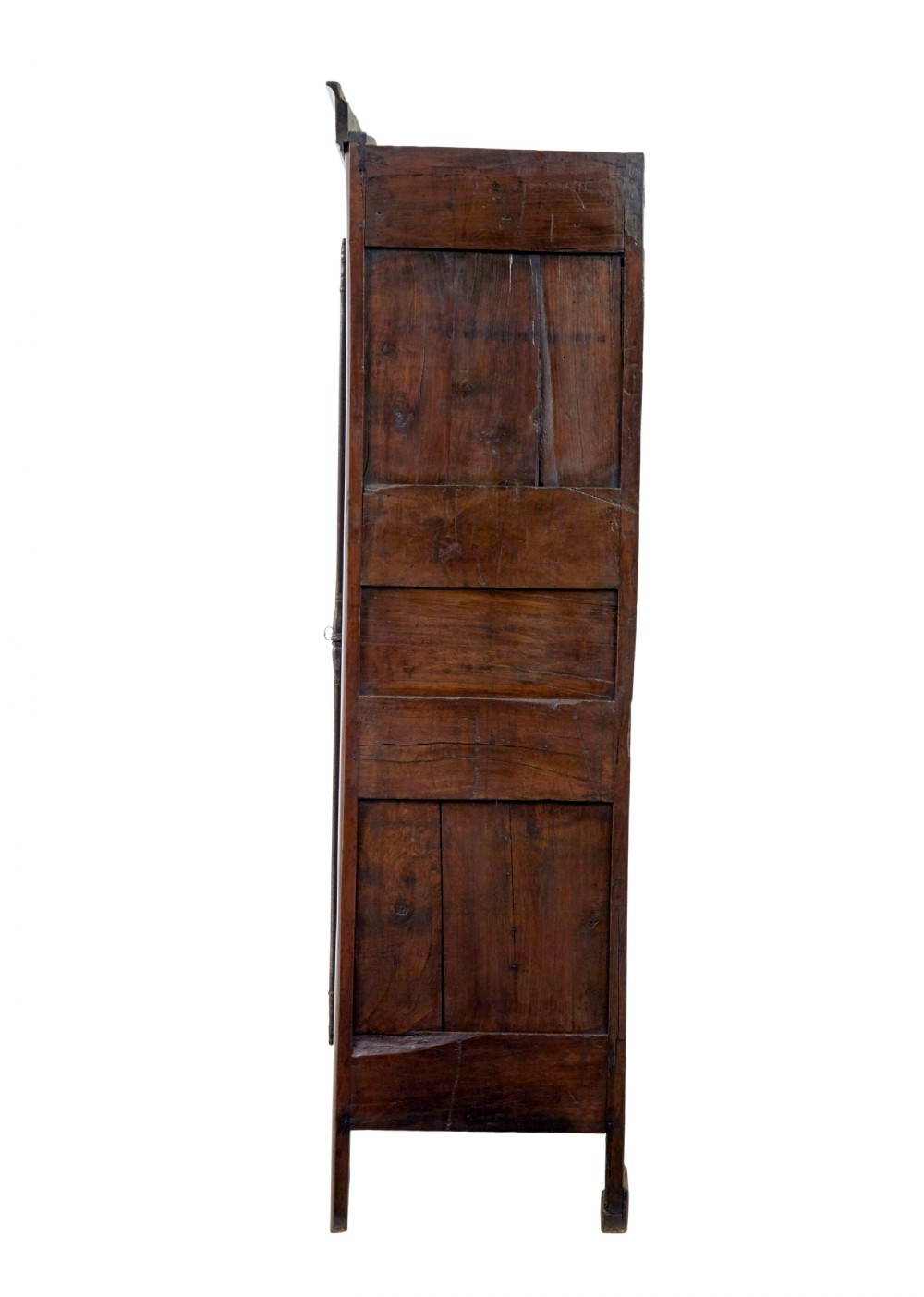 An 18th-century French armoire in warm brown yew and chestnut wood featuring carved foliate inlay, arched panel doors, and long iron escutcheons. View III