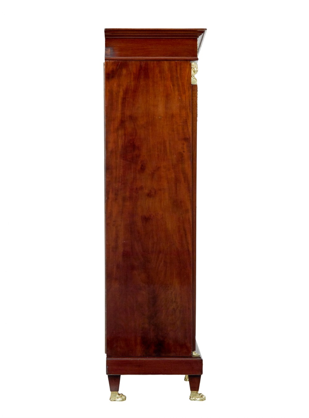 A late nineteenth-century French Empire style mahogany cabinet featuring three doors, central glass panelling, and ornate gold-coloured ormolu mounts. View IV