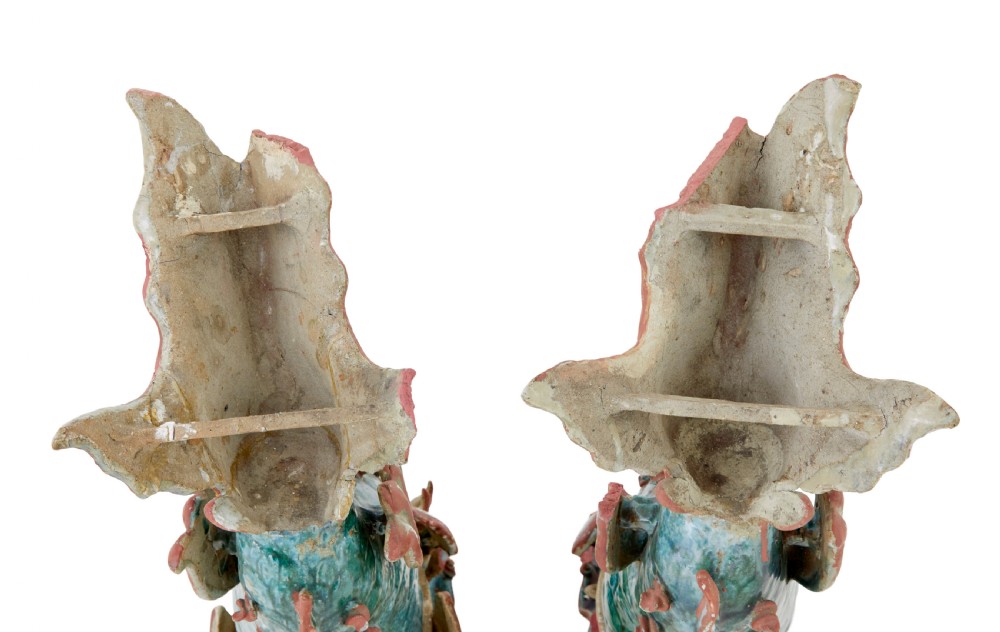 A pair of 19th-century Japanese glazed ceramic Shachihoko roof ornaments depicting dragon-headed carp with raised tails in green, red, and cream glazes. View VI