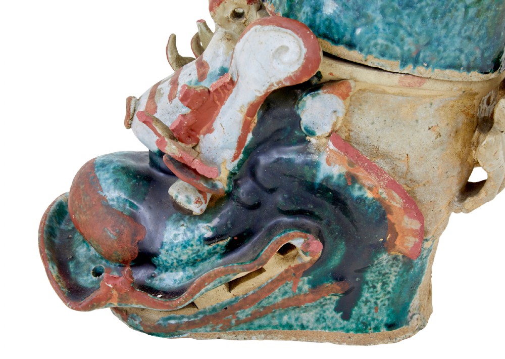 A pair of 19th-century Japanese glazed ceramic Shachihoko roof ornaments depicting dragon-headed carp with raised tails in green, red, and cream glazes. View VII