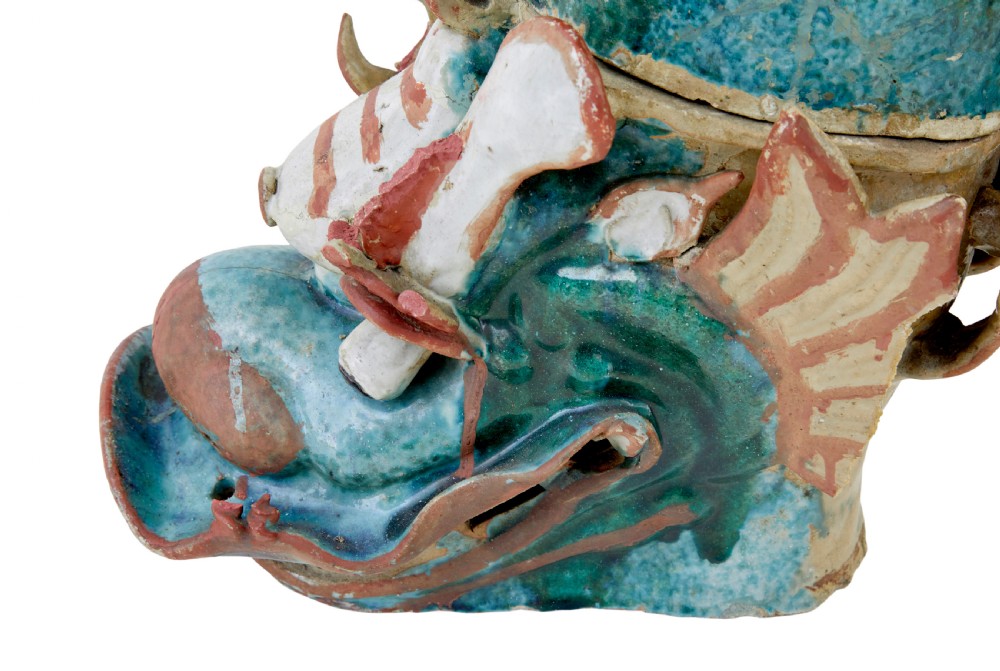 A pair of 19th-century Japanese glazed ceramic Shachihoko roof ornaments depicting dragon-headed carp with raised tails in green, red, and cream glazes. View VIII