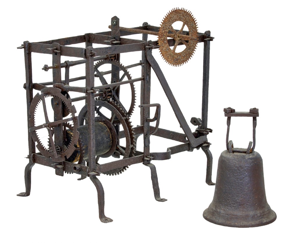 A square 18th-century Swedish copper turret clock face featuring a green verdigris patina, central sunburst motif, Roman numerals, and a single hand shaped like a pointer. View V