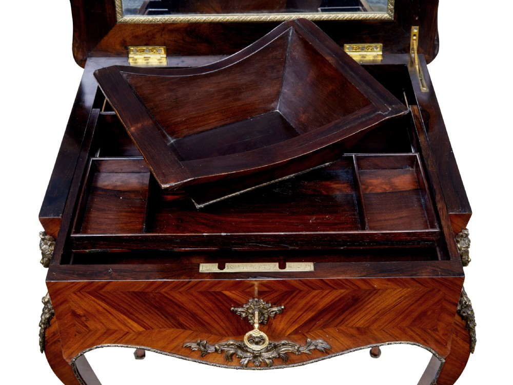 A 19th-century French kingwood sewing work table featuring parquetry veneering, cabriole legs, gilt-bronze mounts, and a lower fabric-lined storage bin. View VIII