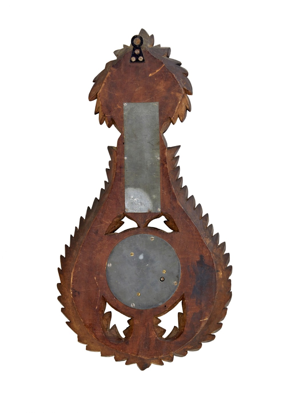 A 19th-century dark carved walnut aneroid wall barometer featuring foliate leaf carvings surrounding a central thermometer tube and a lower circular glass dial. View VI