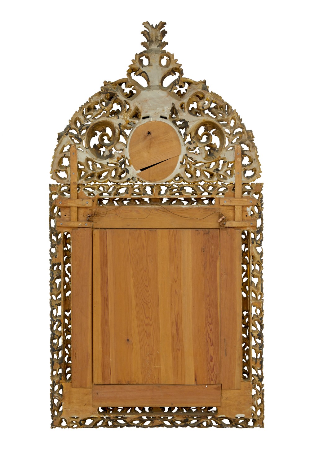An ornate gold gilt wall mirror featuring a carved cushion frame decorated with floral motifs, scrollwork, and an etched oval glass crest. View VII