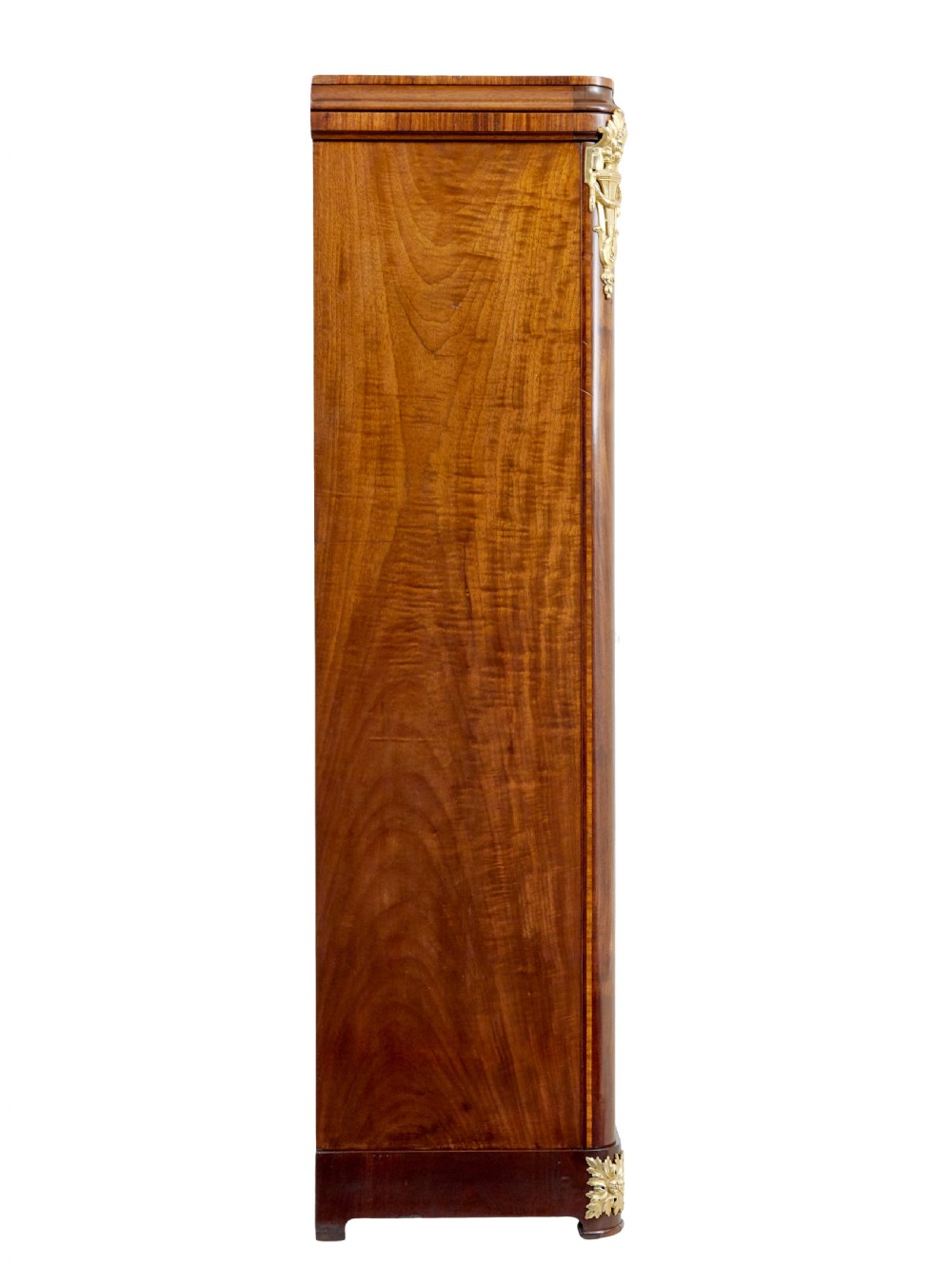 A nineteenth-century French Empire style mahogany cabinet featuring decorative ormolu mounts, a central brass wire mesh door, and outer panelled doors with shell inlays. View VI
