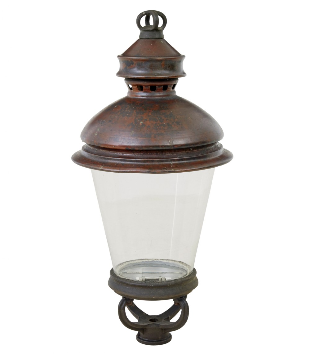 A 19th-century French copper street lantern featuring a conical copper roof with a crown finial and a tapered clear glass shade above a dark metal base. View II