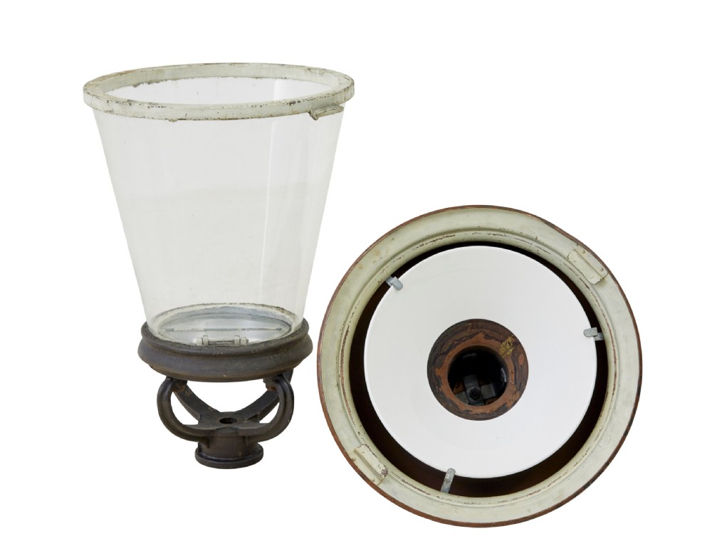 A 19th-century French copper street lantern featuring a conical copper roof with a crown finial and a tapered clear glass shade above a dark metal base. View III