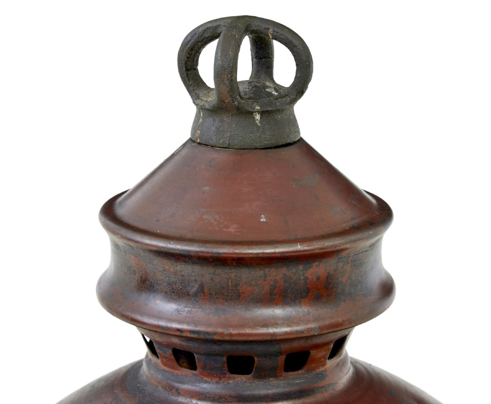 A 19th-century French copper street lantern featuring a conical copper roof with a crown finial and a tapered clear glass shade above a dark metal base. View VI