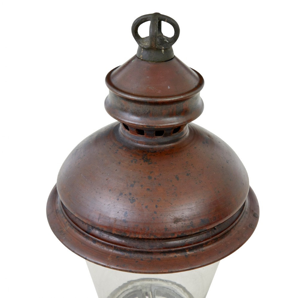 A 19th-century French copper street lantern featuring a conical copper roof with a crown finial and a tapered clear glass shade above a dark metal base. View VII