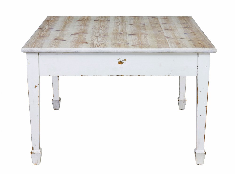 A large square Swedish nineteenth-century kitchen table featuring a natural scrubbed pine plank top and a white painted frame with square tapered legs. View IX