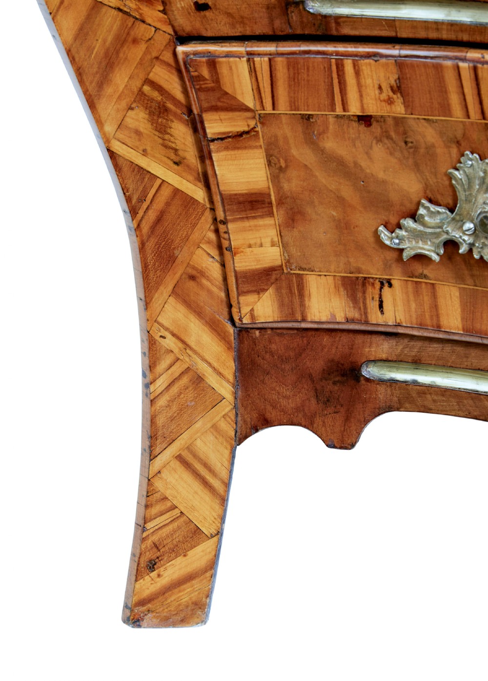 An early nineteenth-century walnut bombe commode featuring three curved drawers with parquetry inlay and ornate brass handles. View XIII