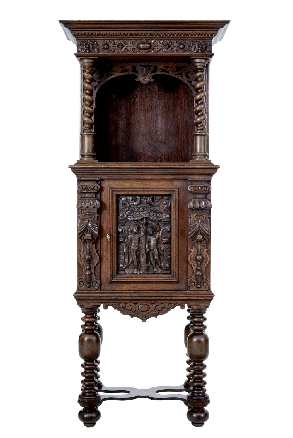 A nineteenth-century Flemish carved oak hall cupboard featuring an upper open niche framed by spiral columns above a single relief-carved door mounted on turned legs. View III