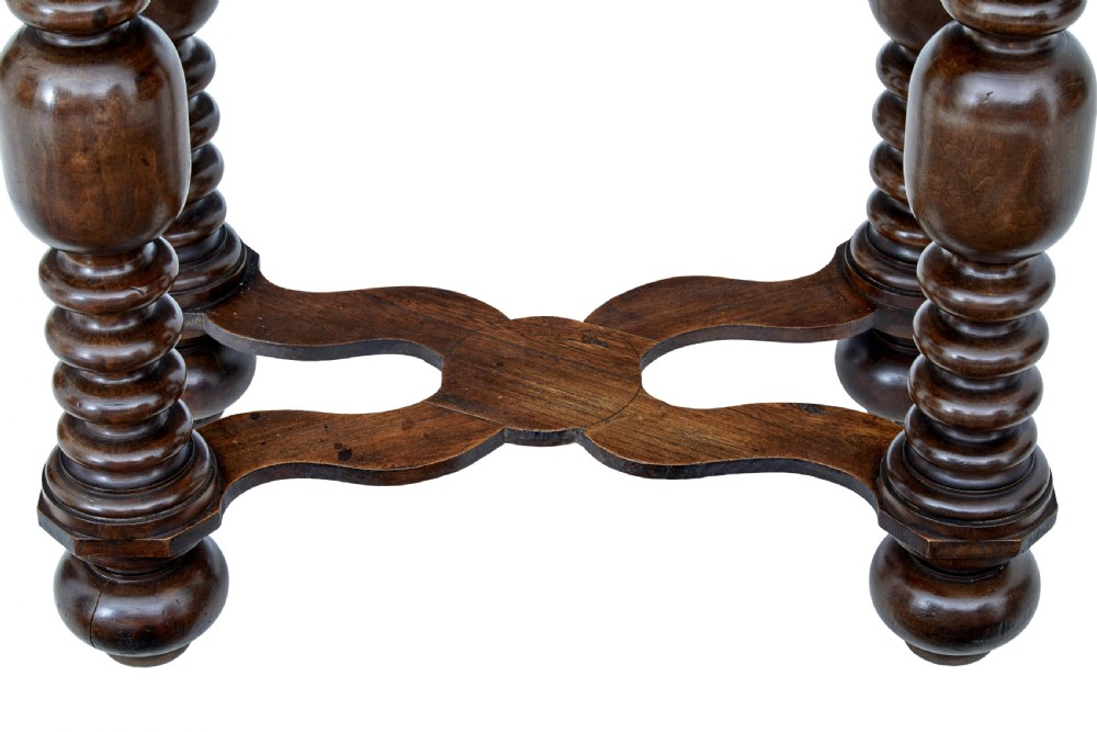 A nineteenth-century Flemish carved oak hall cupboard featuring an upper open niche framed by spiral columns above a single relief-carved door mounted on turned legs. View VIII