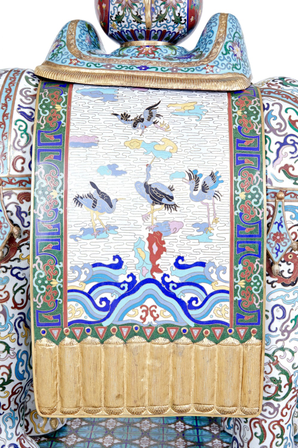 An ornate Chinese cloisonne enamel elephant sculpture with a decorated saddle blanket, standing atop a matching enamel pedestal base. View VII