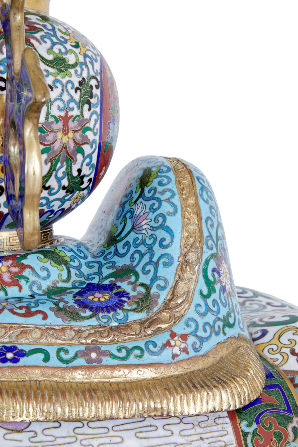 An ornate Chinese cloisonne enamel elephant sculpture with a decorated saddle blanket, standing atop a matching enamel pedestal base. View XI