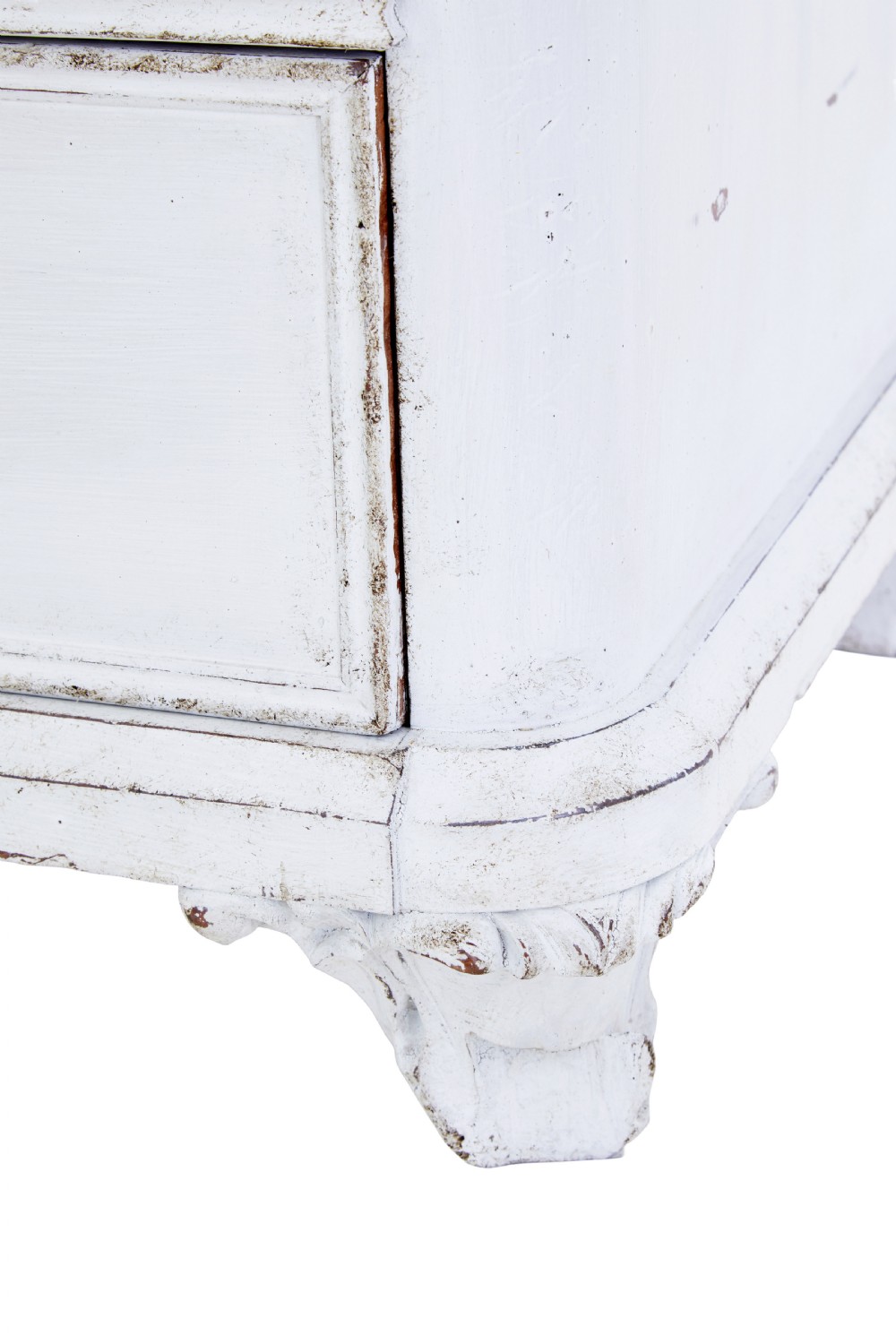 A 19th-century Swedish chest of drawers featuring three long drawers with central escutcheons and a distressed white painted finish resting on carved feet. View VIII