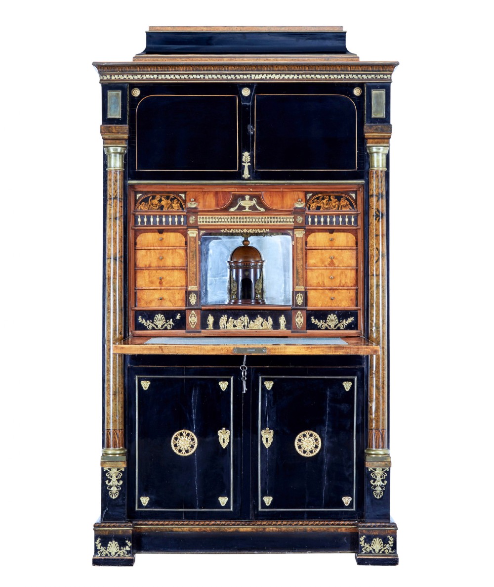 An early 19th-century ebonised birch Biedermeier escritoire featuring gilded bronze mounts, architectural side columns, and multiple cabinet doors. View III