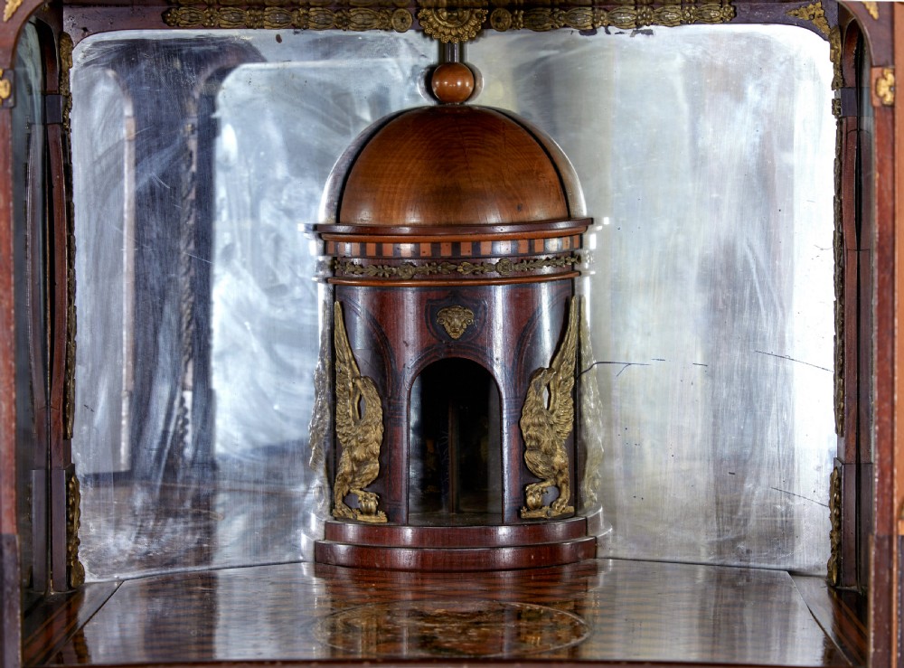 An early 19th-century ebonised birch Biedermeier escritoire featuring gilded bronze mounts, architectural side columns, and multiple cabinet doors. View IX