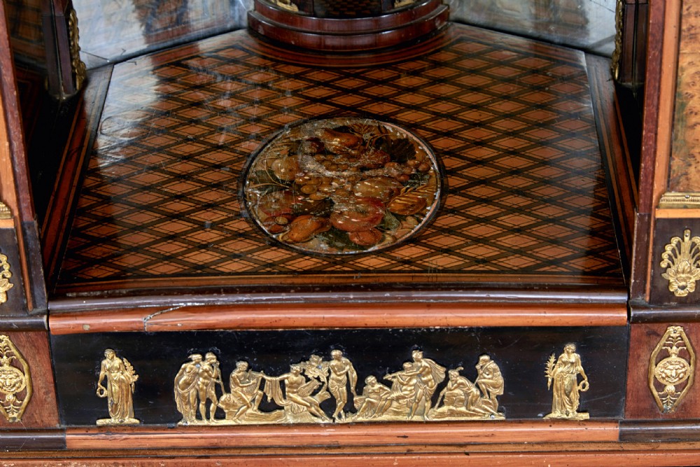 An early 19th-century ebonised birch Biedermeier escritoire featuring gilded bronze mounts, architectural side columns, and multiple cabinet doors. View X