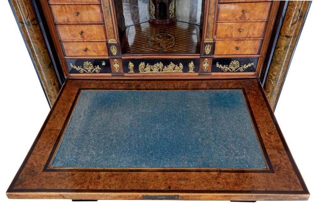 An early 19th-century ebonised birch Biedermeier escritoire featuring gilded bronze mounts, architectural side columns, and multiple cabinet doors. View XI