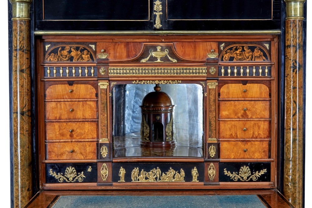 An early 19th-century ebonised birch Biedermeier escritoire featuring gilded bronze mounts, architectural side columns, and multiple cabinet doors. View XIII