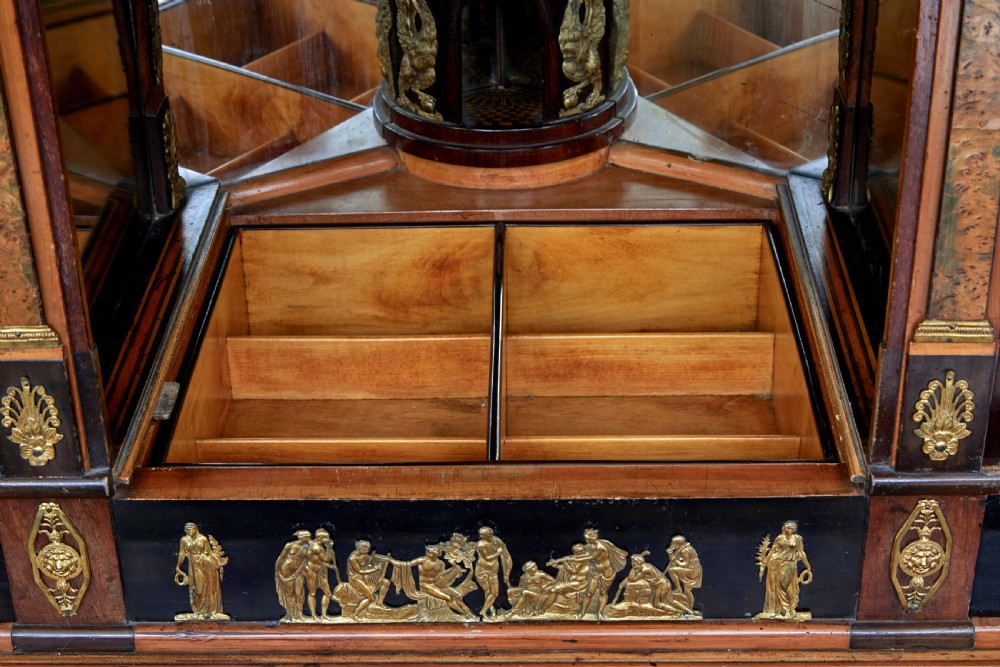 An early 19th-century ebonised birch Biedermeier escritoire featuring gilded bronze mounts, architectural side columns, and multiple cabinet doors. View XVII