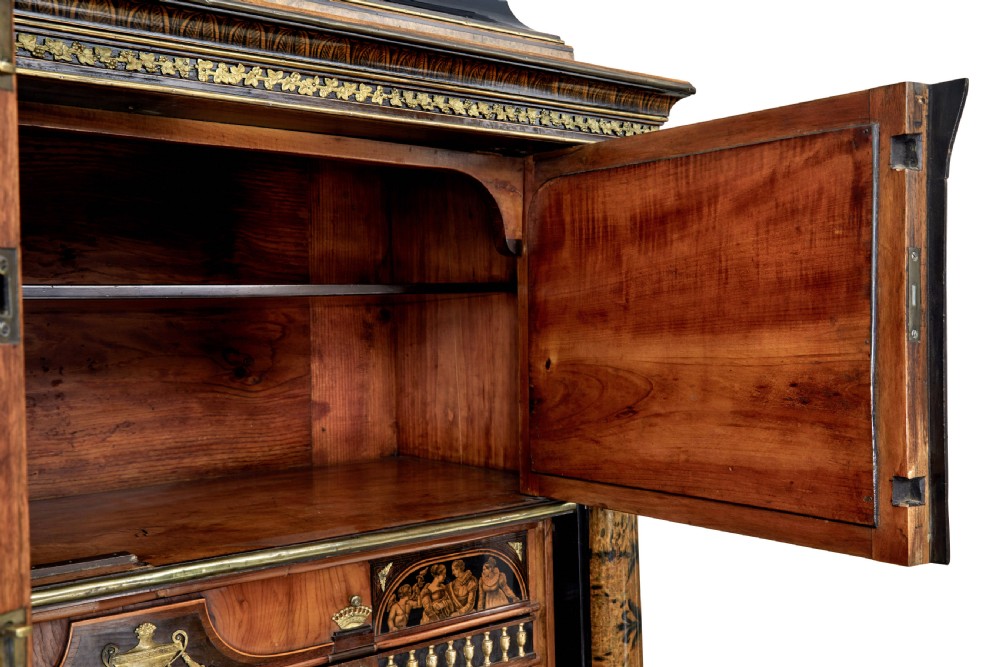 An early 19th-century ebonised birch Biedermeier escritoire featuring gilded bronze mounts, architectural side columns, and multiple cabinet doors. View XX
