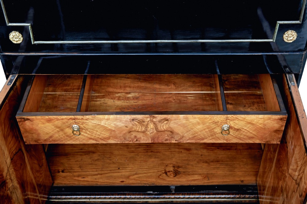 An early 19th-century ebonised birch Biedermeier escritoire featuring gilded bronze mounts, architectural side columns, and multiple cabinet doors. View XXI